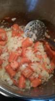 Add carrots and saute some more